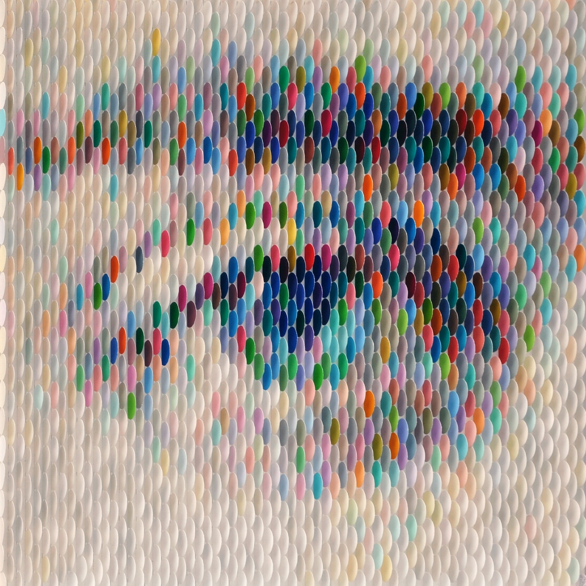An example of Art Materialism - close up of an eye and eyebrow made with paint swatches by artist Peter Combe