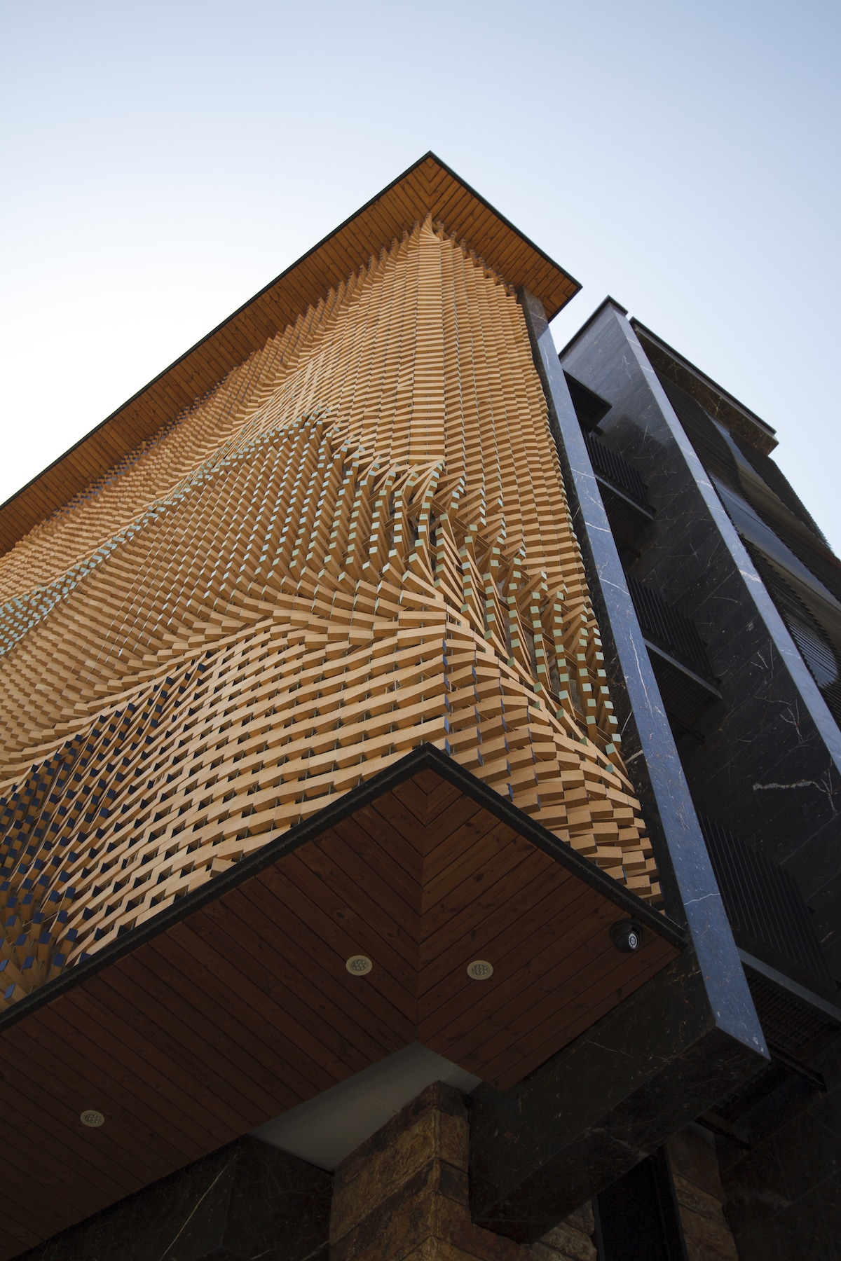 Brick Screen of Revolving Bricks Serai by Farhad Mirzaie and A.P.P Architects & Associates