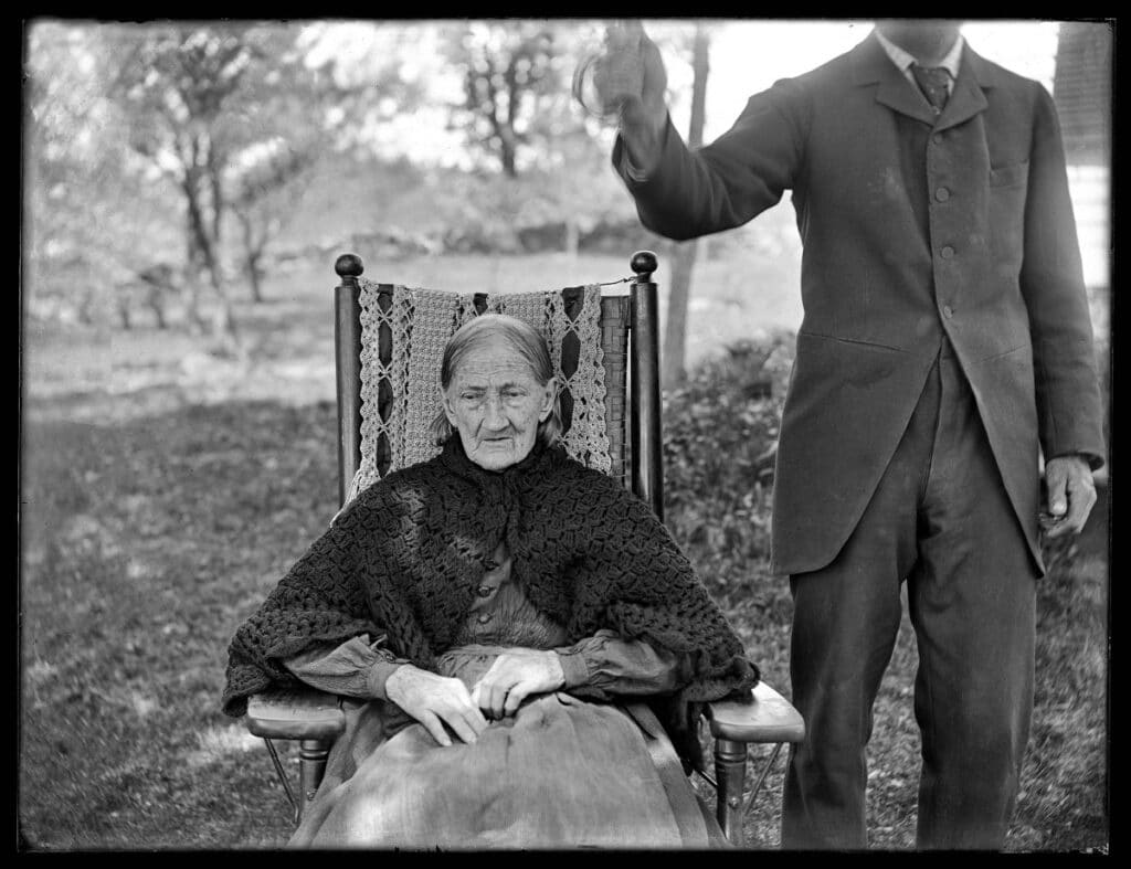 Old woman in a rocking chair from the late-19th century