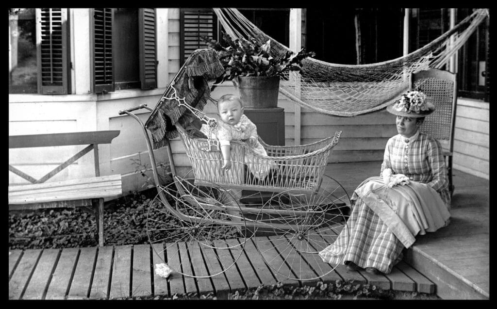 Image of a woman and baby in a carriage from the mid-19th century